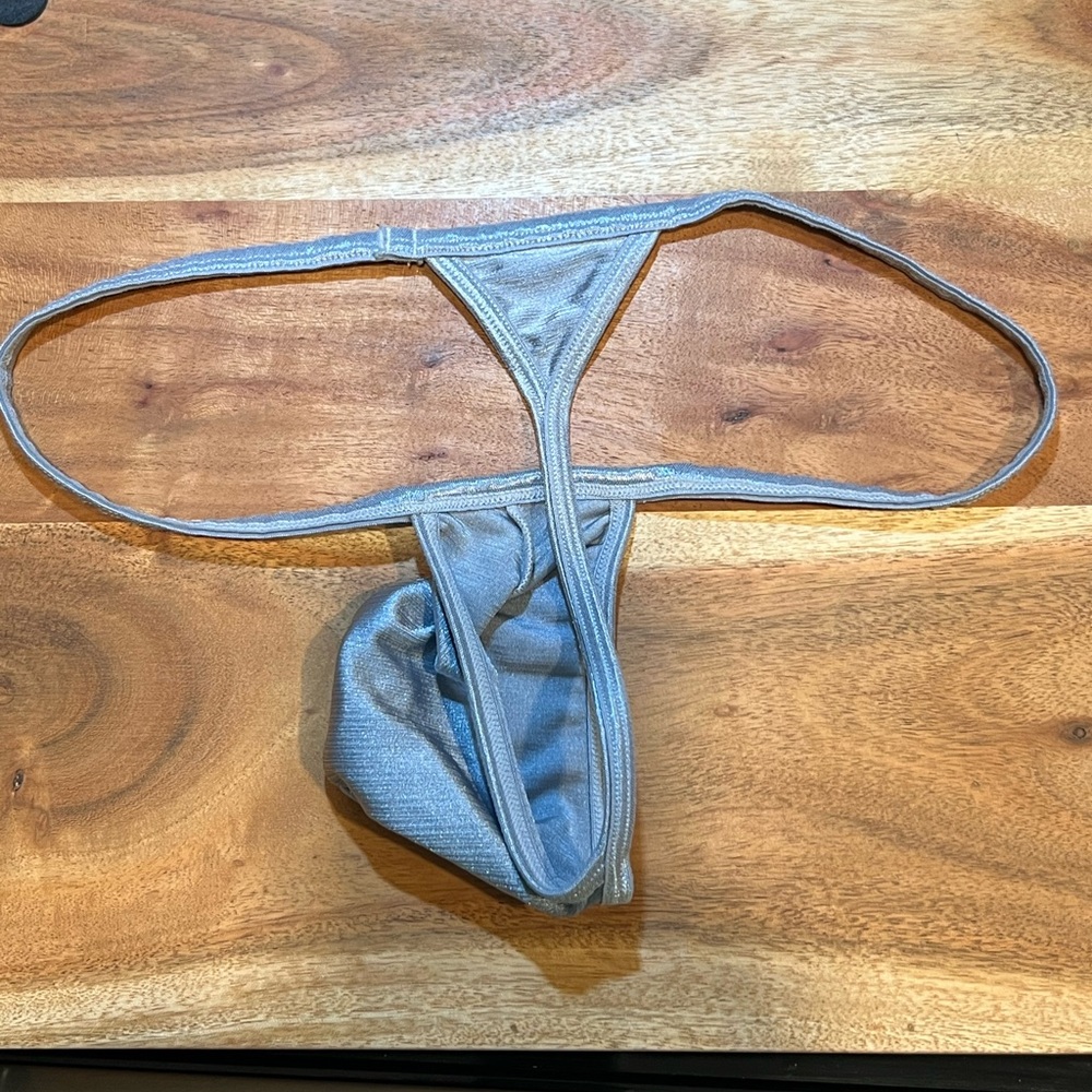Grey color thong, 50%polyester , size medium